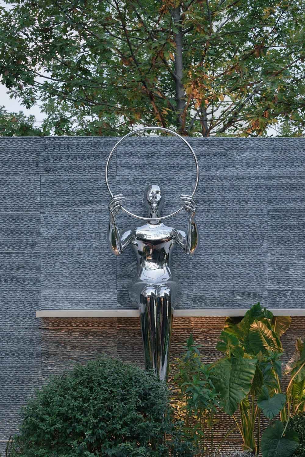 STAINLESS STEEL FIGURE SCULPTURES (2)